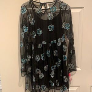 Black dress with floral embroidery. Never worn.